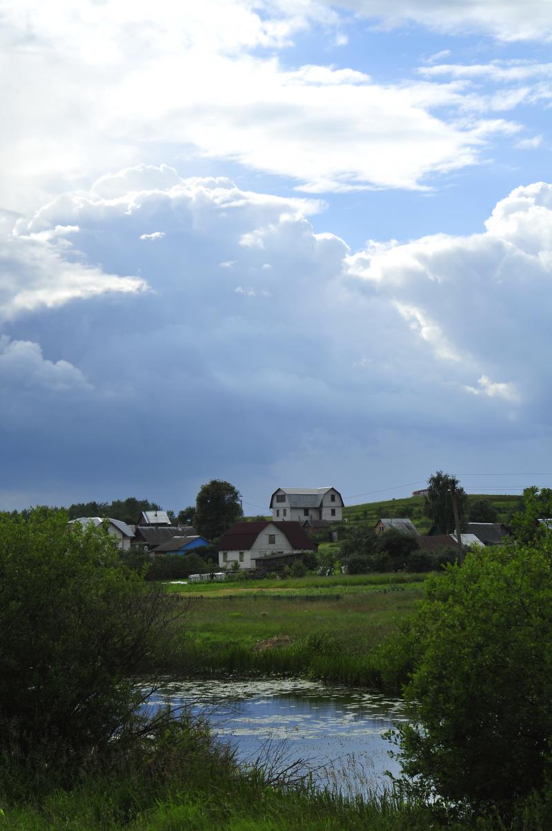 Rural dach settlement with pond