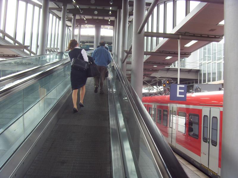 Passengers on an airport connection by train
