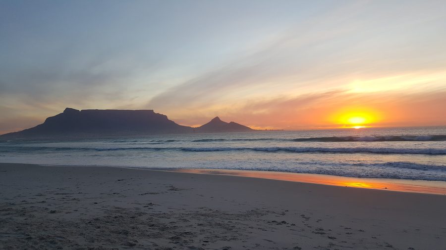 View of Table Mountain and Lion’s Head at sunset from Sunset Beach