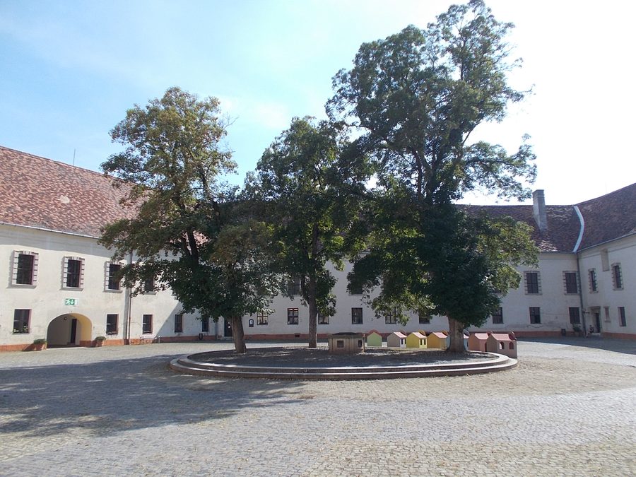 Nádasdy Castle courtyard with cobblestones and the southwest wing in Sárvár