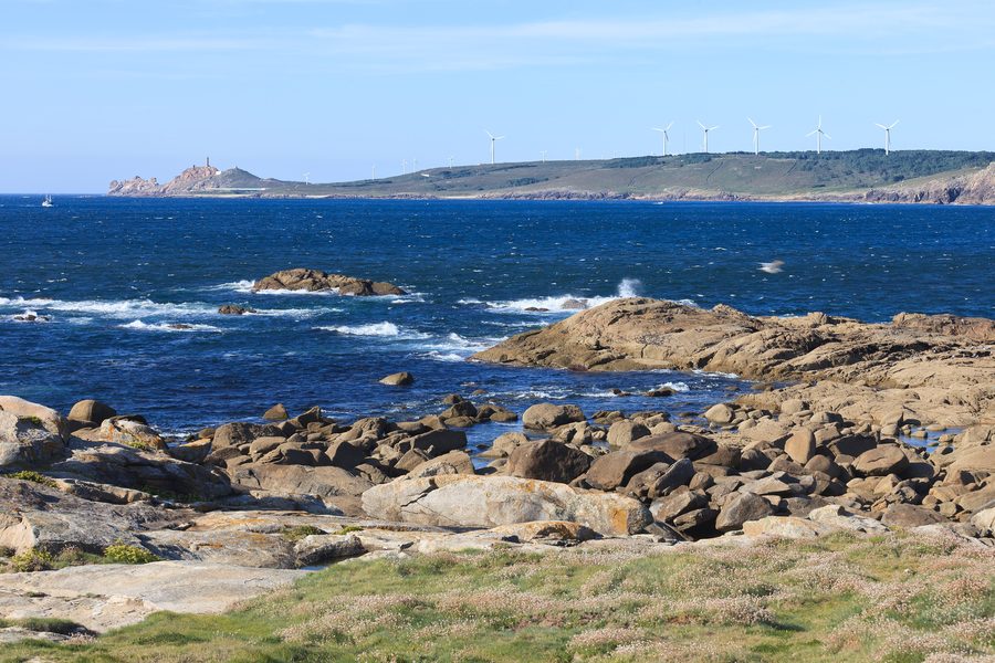 The sea in Muxía, Galicia, with O Vilán cape in the background