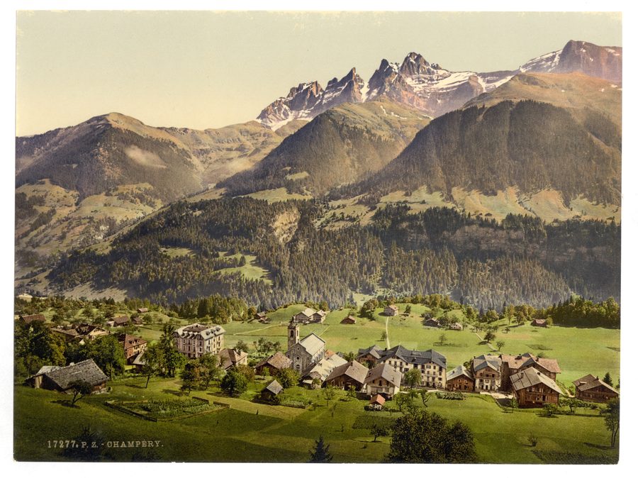 Historic panoramic view of Champéry in Valais against an alpine mountain backdrop