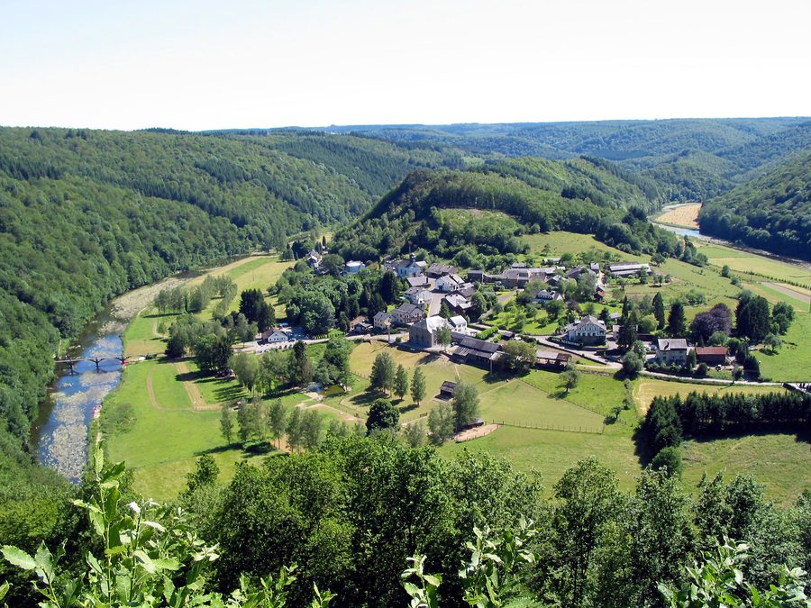 The Semois River winding through a wooded valley near Frahan in the Belgian Ardennes.