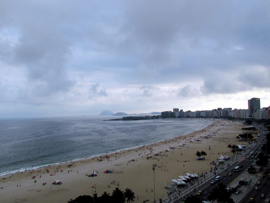 Copacabana Beach with the neighboring city skyline in Rio de Janeiro.