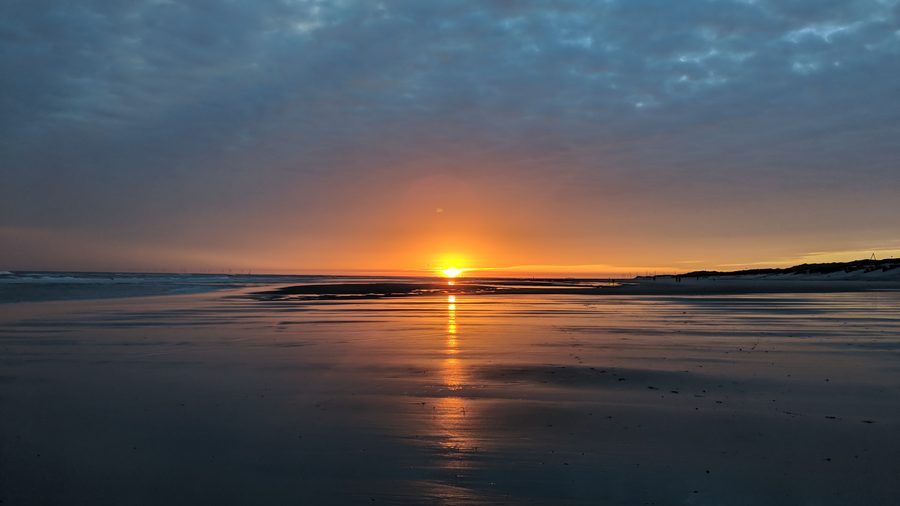 Main beach of Wangerooge at low tide during dawn
