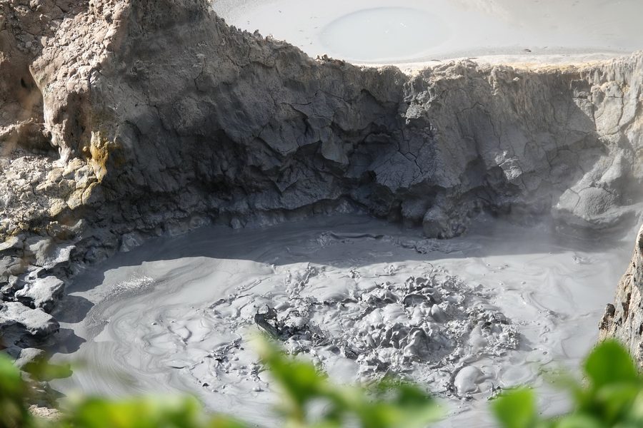 Dark sulfurous mud pool at Sulphur Springs on Saint Lucia.
