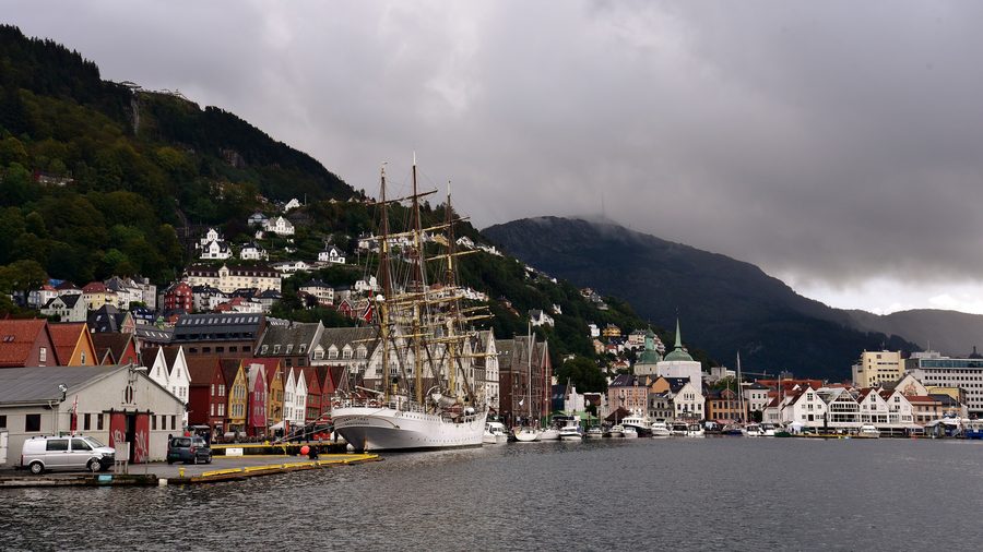 The historic wooden houses of Bryggen on the Vågen harbor basin in Bergen.