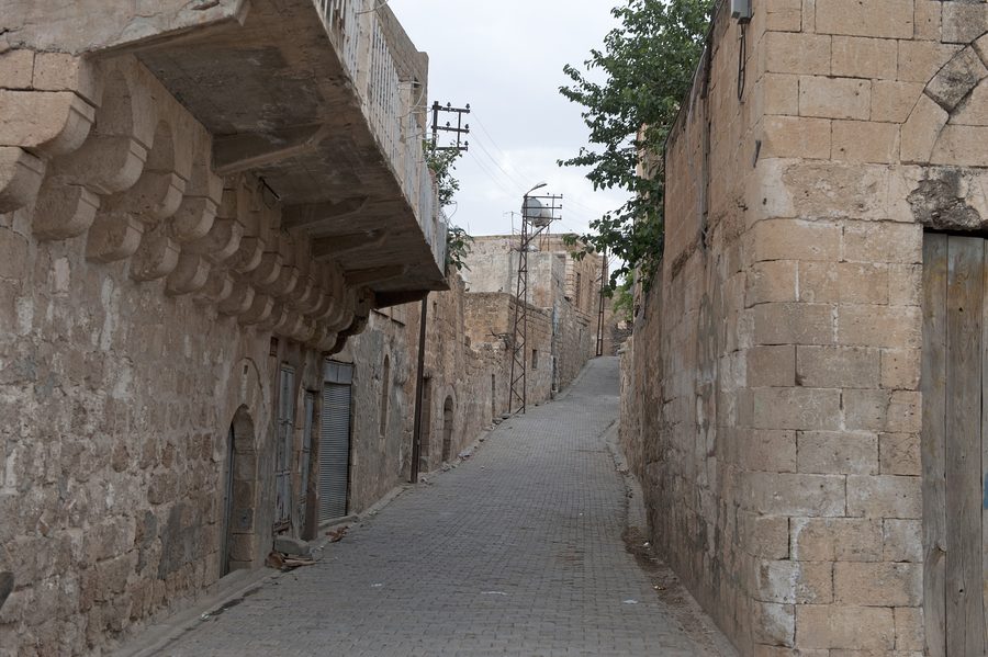 Historic stone houses and narrow alleys in the old town of Midyat