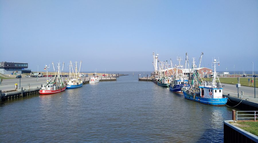 Fishing harbor Dornumersiel seen seaward from the pumping station