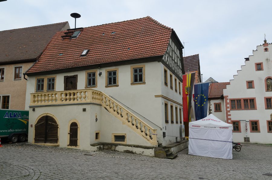 Historic town hall on Wipfeld’s market square with half-timbered gable and outside staircase