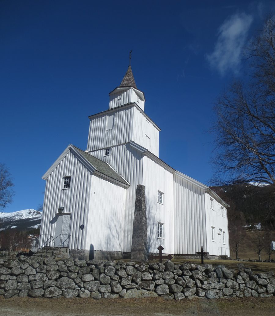 Valle Church with a memorial in front
