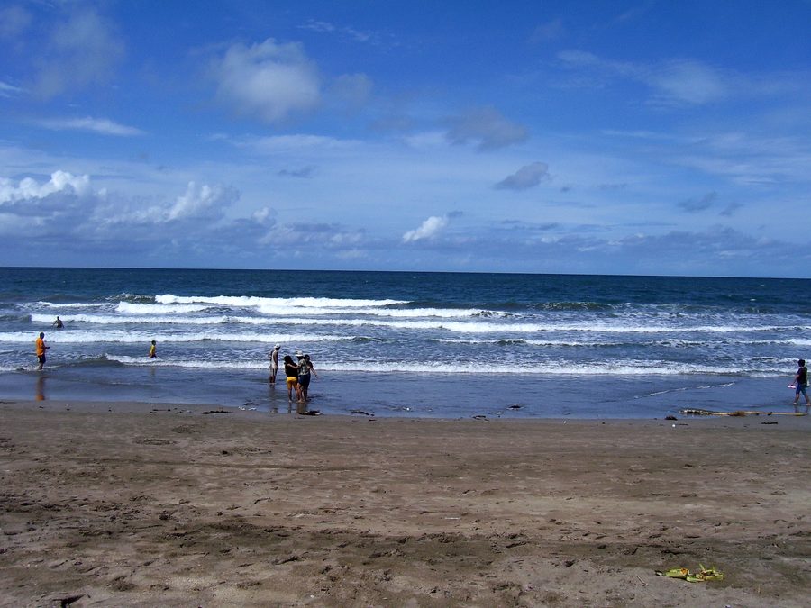 Kuta Beach with long sandy beach in Badung, Bali