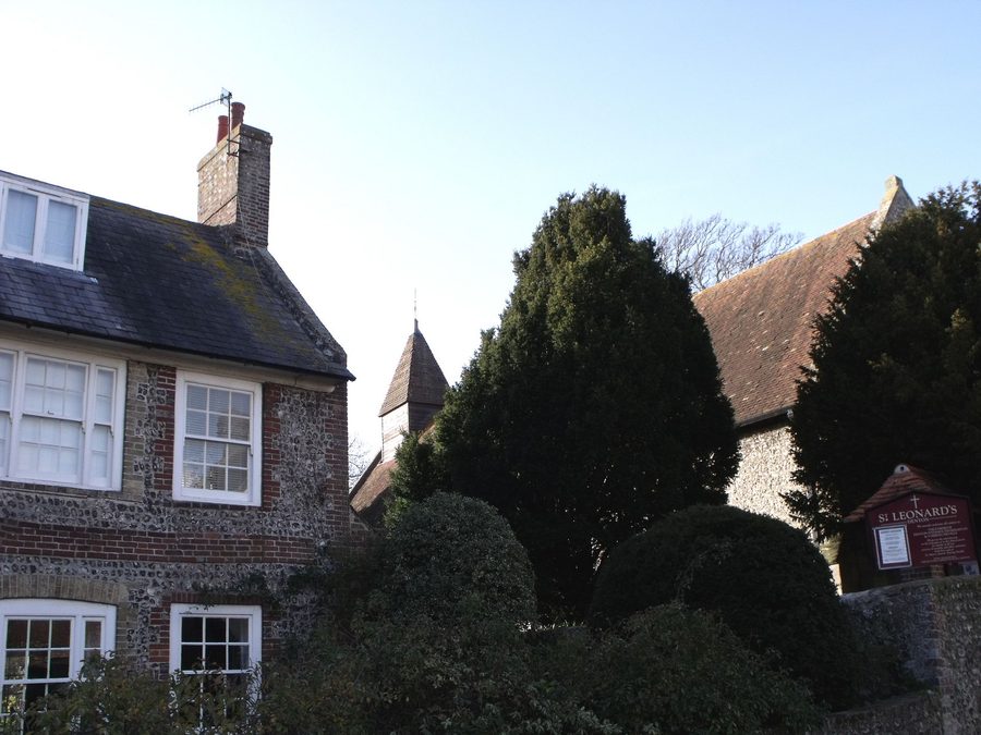 The manor house and church in Denton, East Sussex