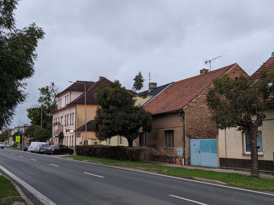 Masarykova Street in Rudná with residential buildings and an inn