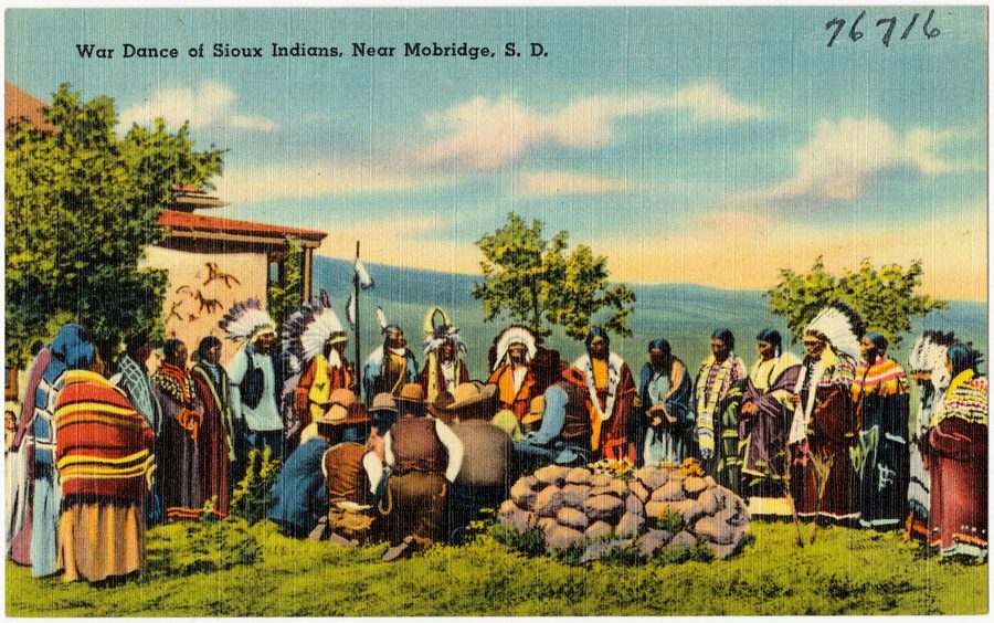 Historical postcard showing a war dance of Sioux Indians near Mobridge, South Dakota
