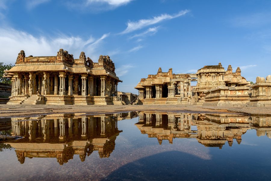 Vijaya Vittala Temple in Hampi, Karnataka, reflected in a shallow water basin