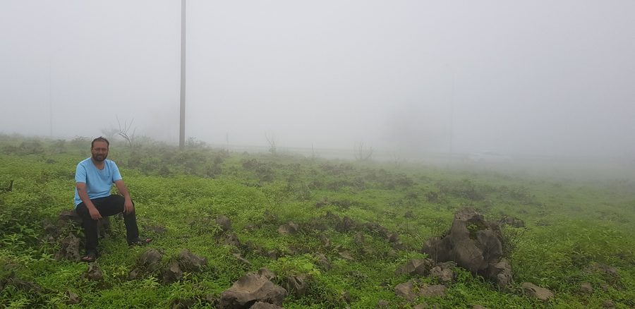 Green mountain landscape near Nabi Ayub close to Salalah during the Khareef season