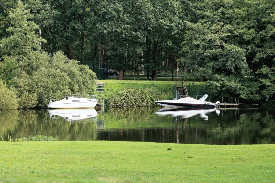 Herbrum old Ems channel near Papenburg with the opposite riverbank landscape