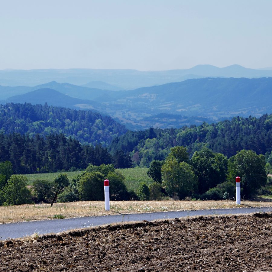The Mézenc massif in the distance in the open landscape of Haute-Loire