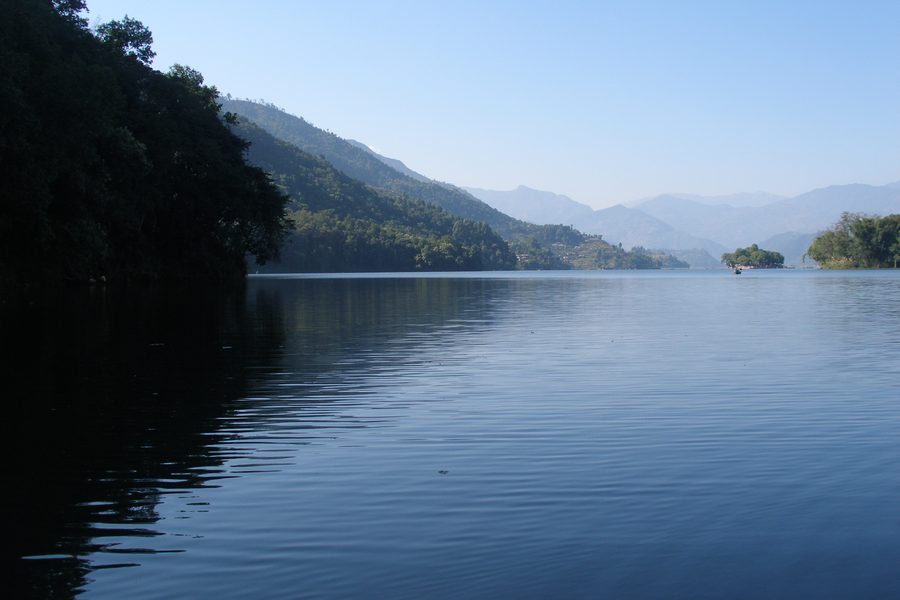 Phewa Lake with mountain backdrop in Nepal