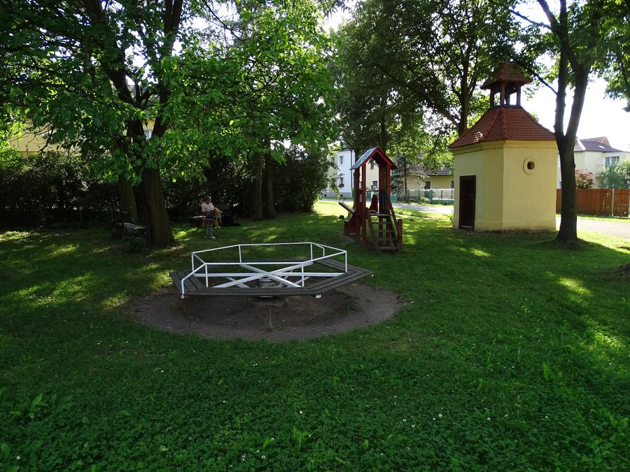Playground and chapel in Sedlecko, a district of Bušovice