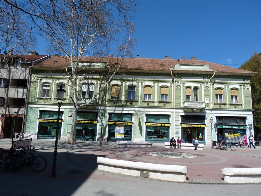 Historic two-story corner house at Andrássy út 19 in Békéscsaba