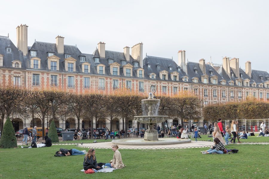 Place des Vosges in Le Marais, showing the historic square and surrounding arcades.