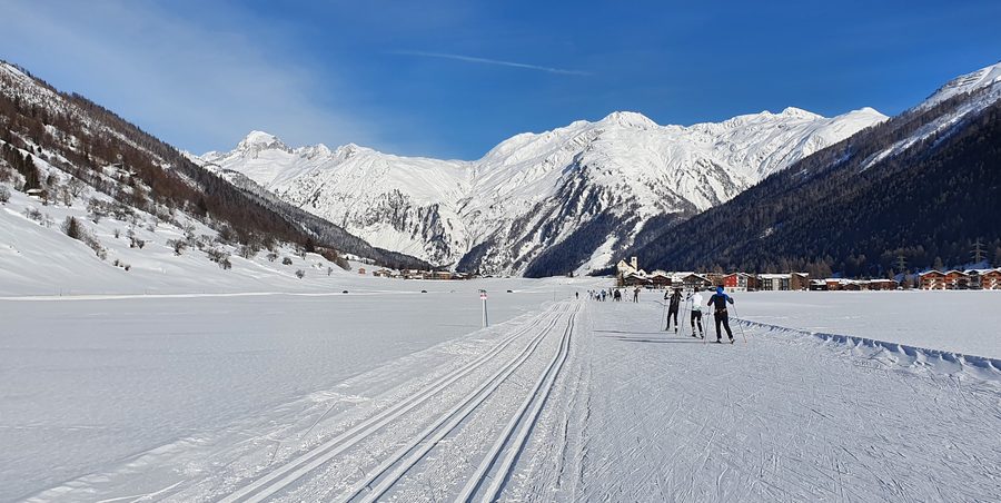 Cross-country ski trail near Obergesteln in Goms with an alpine mountain backdrop