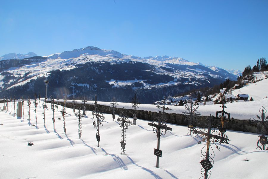 Church of St. Zeno and cemetery in Ladir in winter