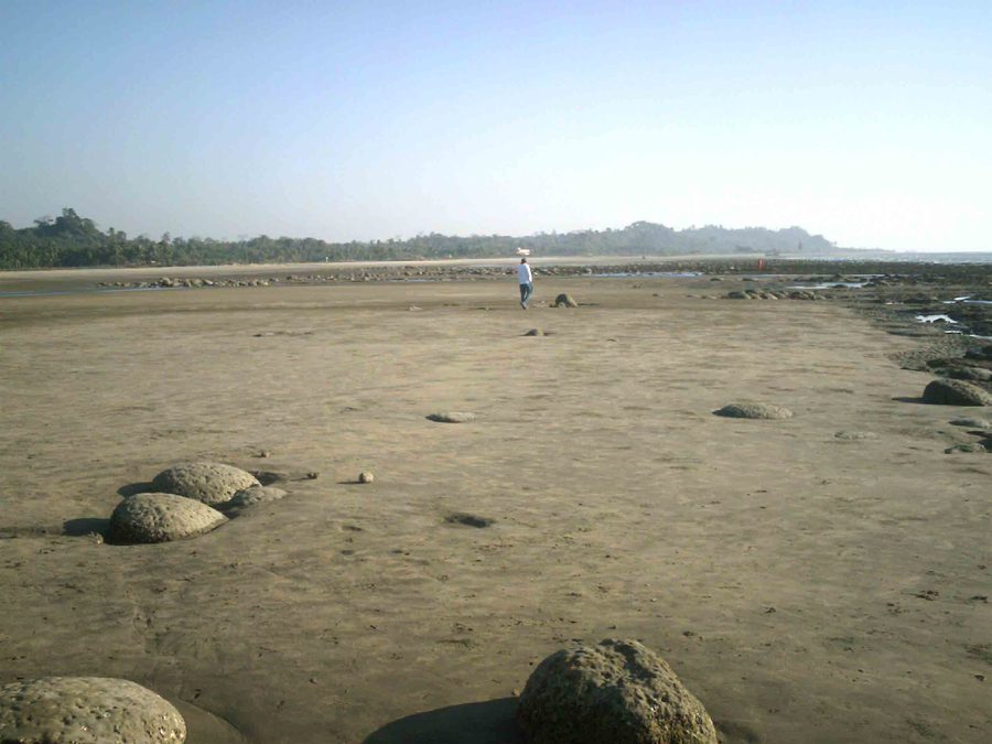 Sandy beach and rocky coast at Inani Beach near Cox's Bazar
