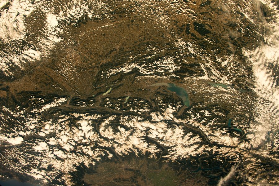 Wide landscape of the European Alps with mountains and valley