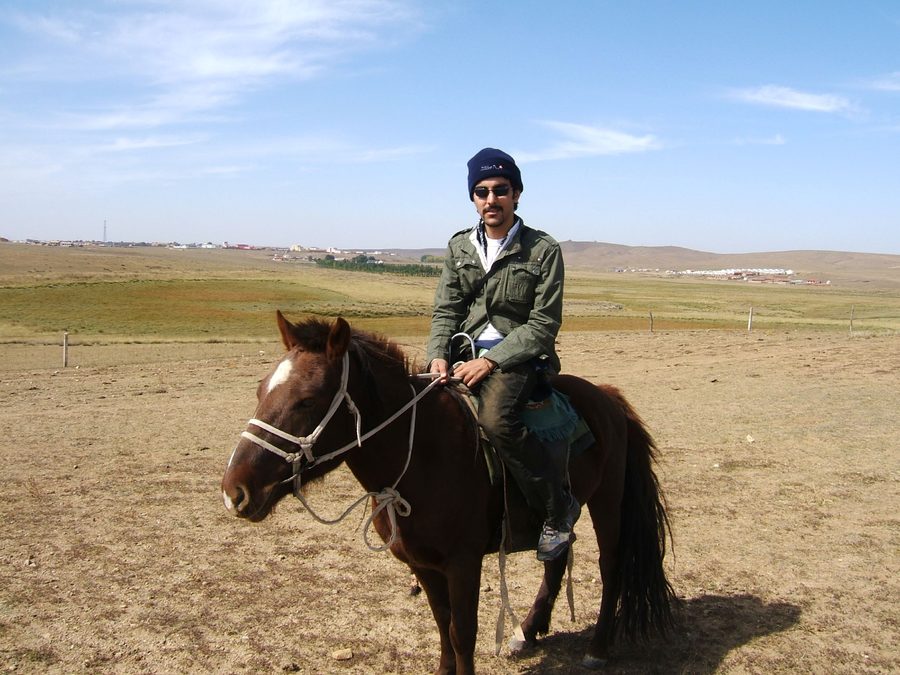 Rider in the Xilamuren grassland near Hohhot, Inner Mongolia
