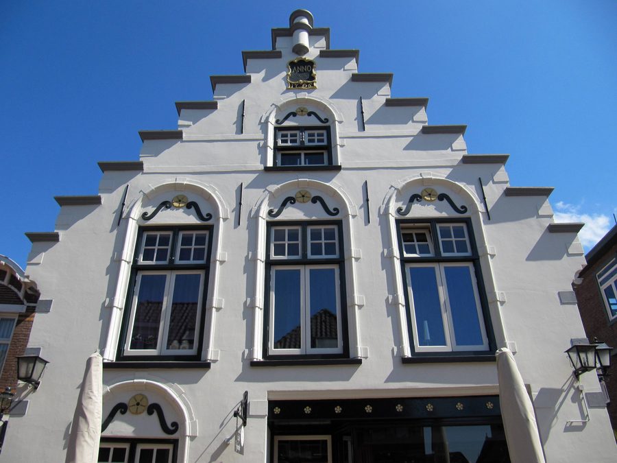 Historic building on Friesestraat in Coevorden with a stepped gable and a facade dating from 1765