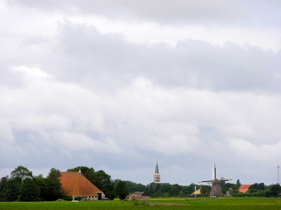 View of Cornwerd with the Sint-Bonifatiuskerk and Cornwerdermolen