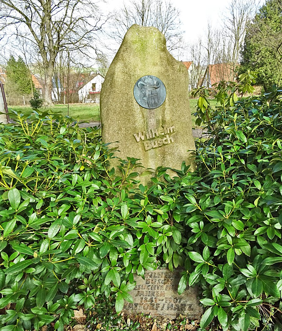 Memorial stone for Wilhelm Busch in the churchyard of St. Pankratius in Hattorf am Harz