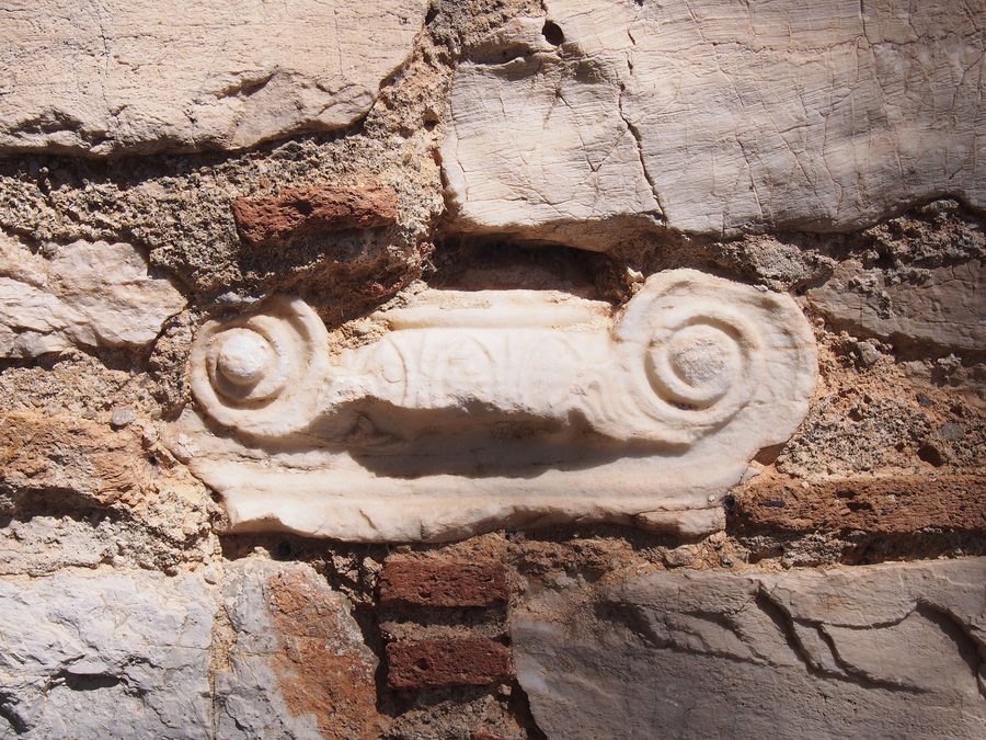 A capital embedded in the south wall of the church of Saint Peter at Ennea Pyrgoi, Kalyvia Thorikou