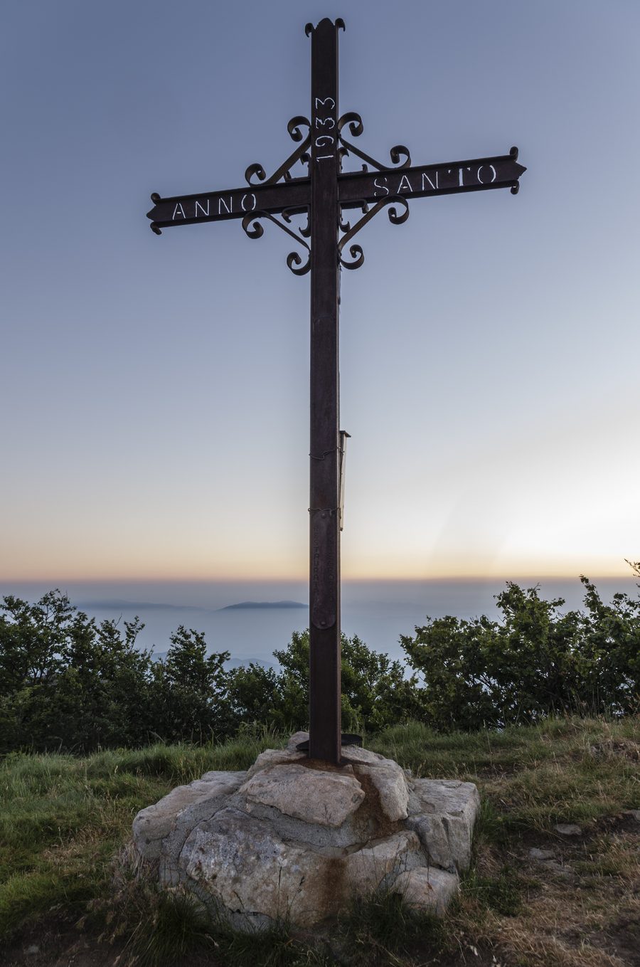 Summit cross on Monte Gottero at sunrise