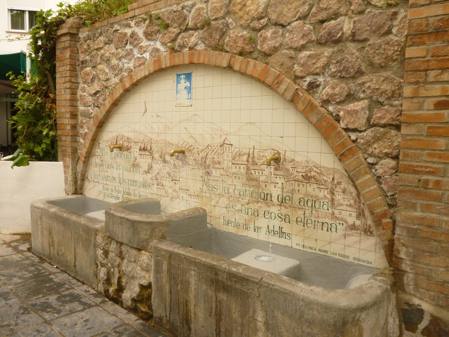 Fountain of water in Lanjarón with inscribed verses