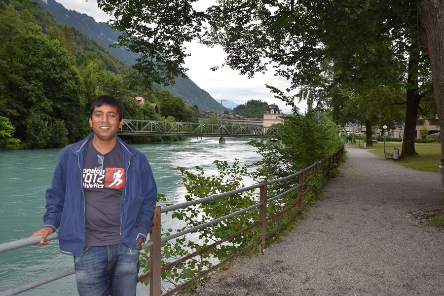 The Aare flows through Interlaken against an alpine backdrop