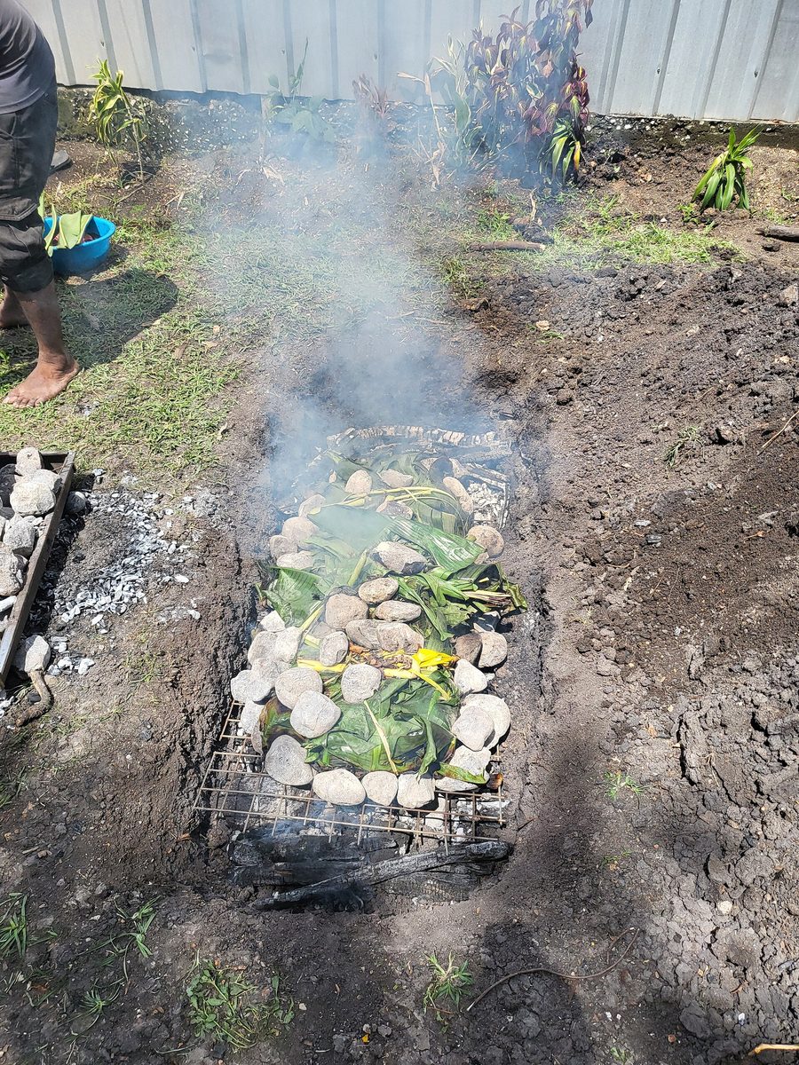 Mumu preparation in Papua New Guinea