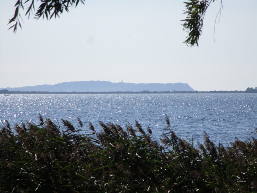 View across the Wieker Bodden to Hiddensee with Bakenberg in the distance