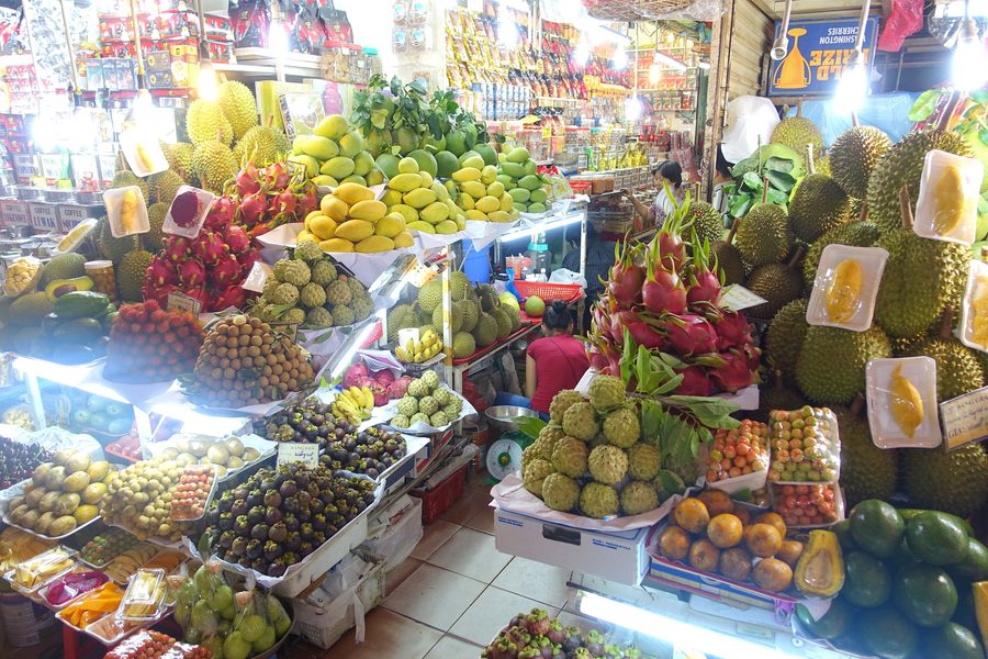Fresh vegetables and other goods at a stall in Bến Thành Market in Ho Chi Minh City