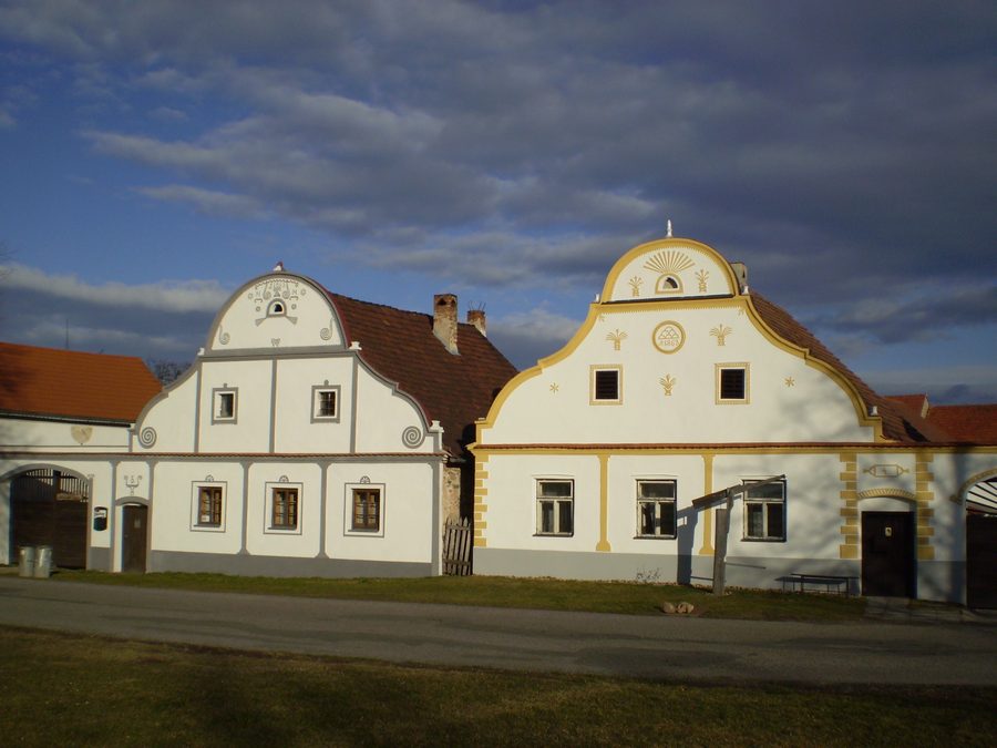 The village square of Holašovice with traditional South Bohemian houses