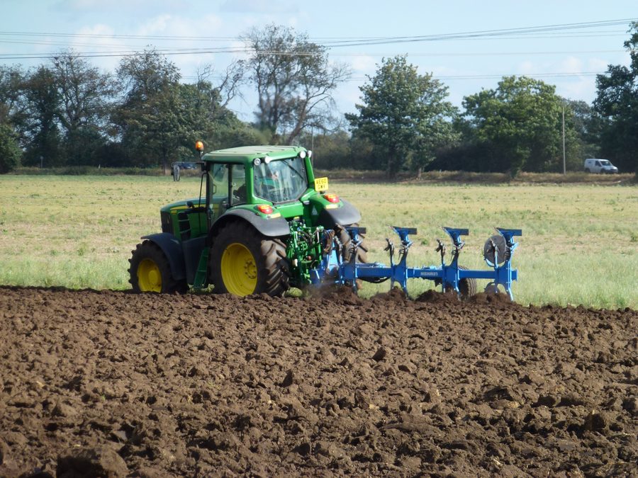 Ploughing in the open landscape of The Fens