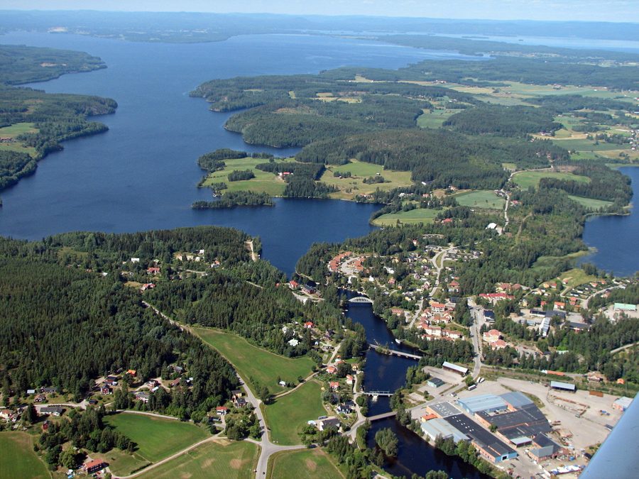 Aerial view of Näsviken in Hälsingland with houses and Lake Sördellen in the background