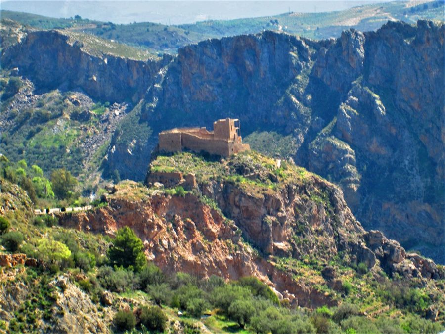 Ruined Arab castle in Lanjarón with mountain scenery in the background