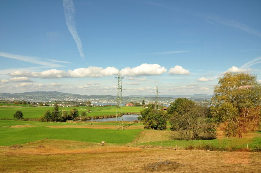 Itlimoosweiher near Samstagern in Wollerau with landscape in the background
