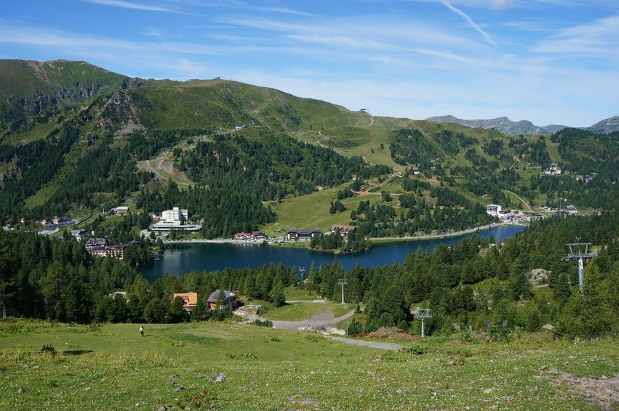 Lake Turracher See in the Nockberge with an alpine mountain landscape