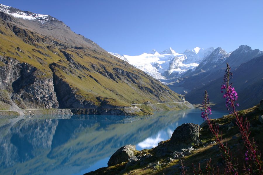 Turquoise-blue Lac de Moiry with mountain scenery and Moiry Glacier in the background