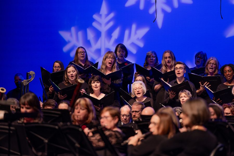 Choir and concert band performing at the Winspear Centre in Edmonton.